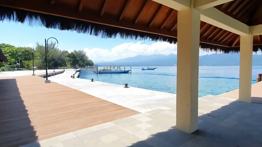 Pier access at Gili Air Port used by passengers boarding and arriving boats.