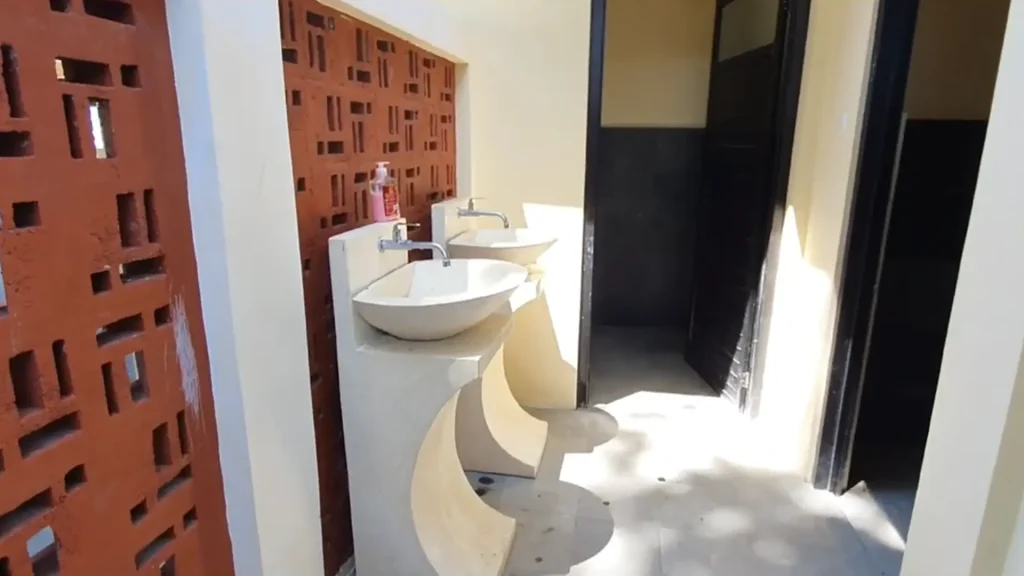 Public restroom area included in Gili Air Port Facilities for passenger convenience.